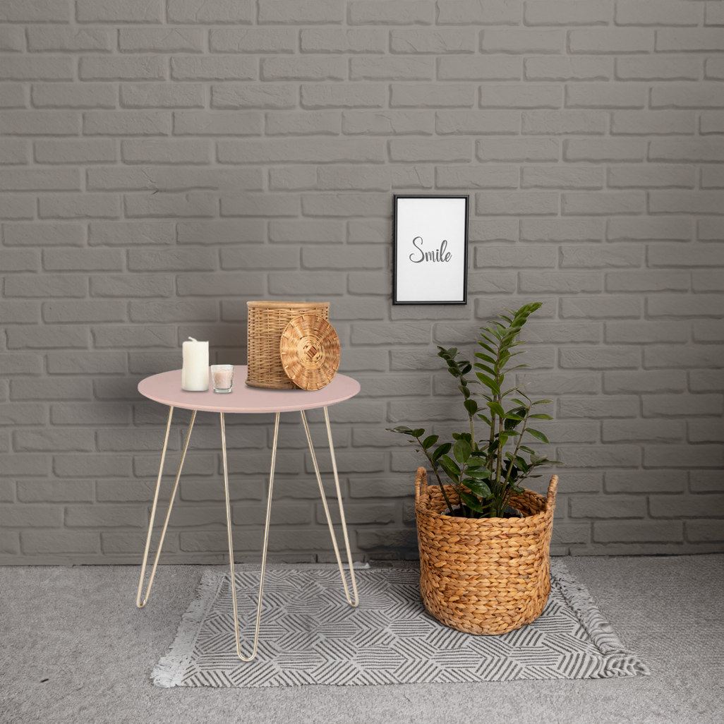 Everfurn Juniper coffee table in pink, displayed in a real-life living room setting, emphasizing its vibrant design and seamless integration into contemporary spaces.