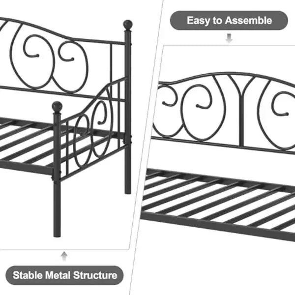 Metal bed frame with decorative scroll design headboard and footboard.