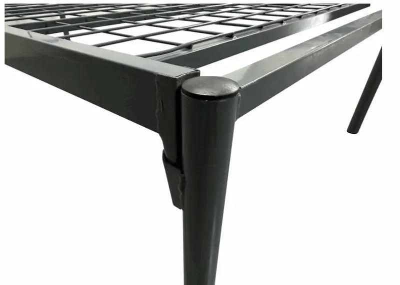 Metal bed frame with black corner posts and support slats.