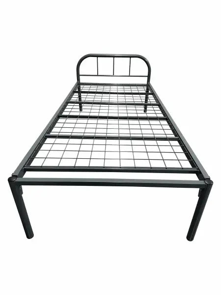 Simple metal bed frame with a wire mesh support surface.