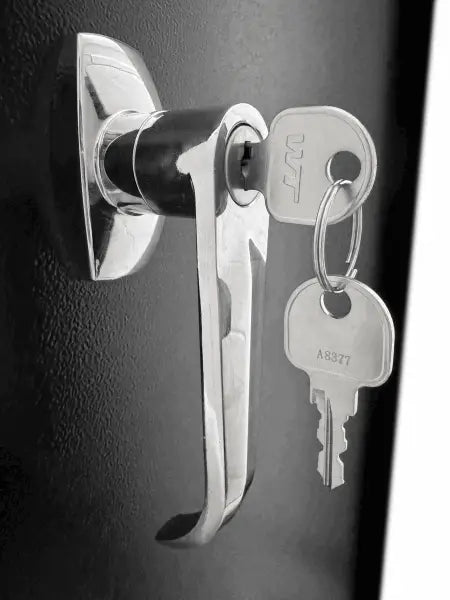 Metal door handle with keys hanging from it.