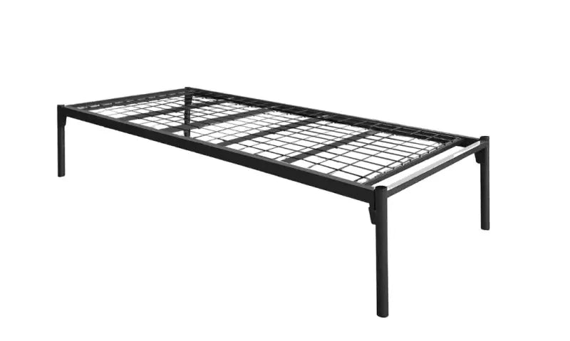 Simple metal bed frame with wire mesh support.