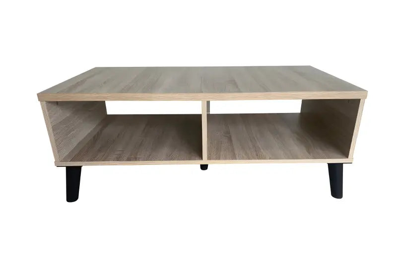 Modern coffee table with two open compartments and black legs.