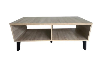Modern coffee table with two open compartments and black legs.
