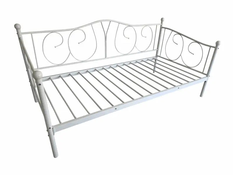 White metal daybed with decorative scrollwork and slatted base