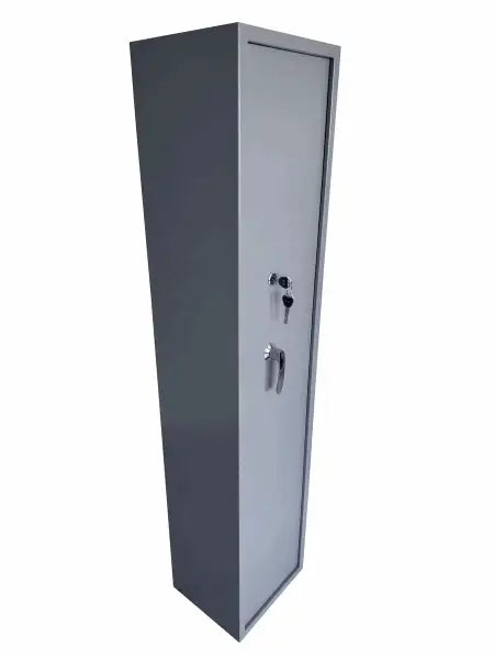Tall grey metal gun safe with a key lock.