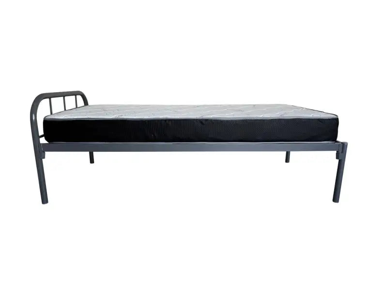 Simple metal bed frame with a black mattress