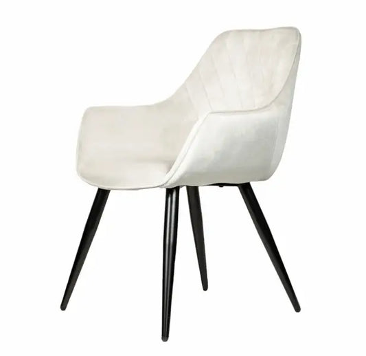 White upholstered armchair with black metal legs