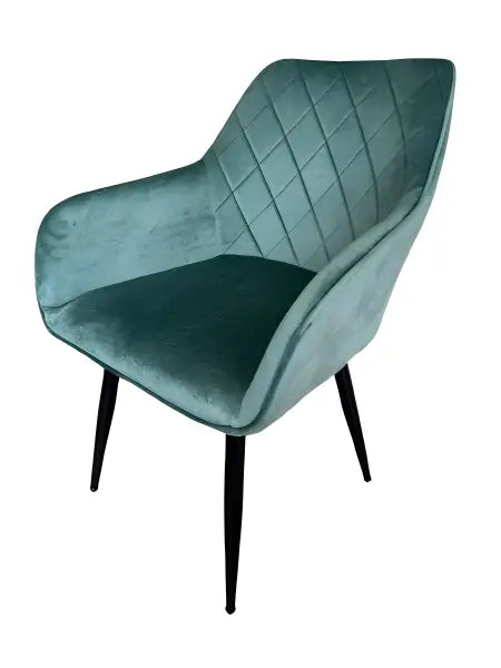 Teal velvet armchair with quilted diamond pattern and black metal legs