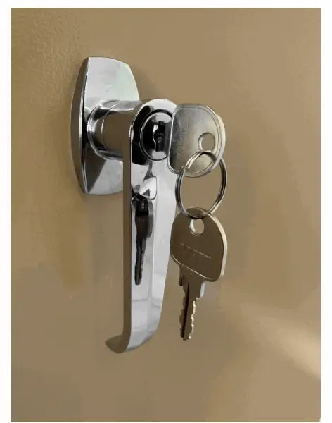 Chrome cabinet handle with keys inserted into its lock mechanism.